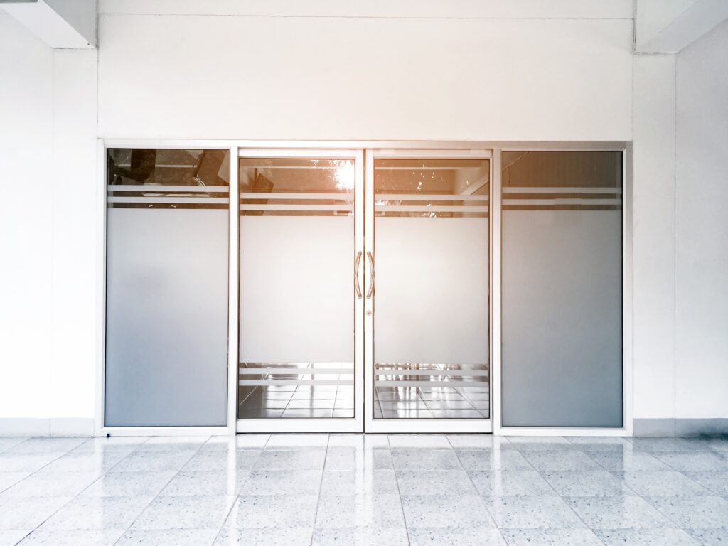 What is the best material for commercial front doors?